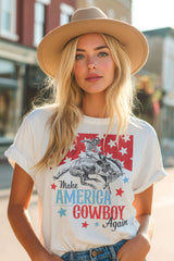 Woman wearing a white t-shirt with a graphic design and text, standing on a street.